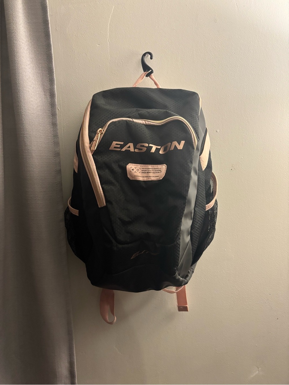 Easton Black and Light Pink Backpack with Multiple Compartments